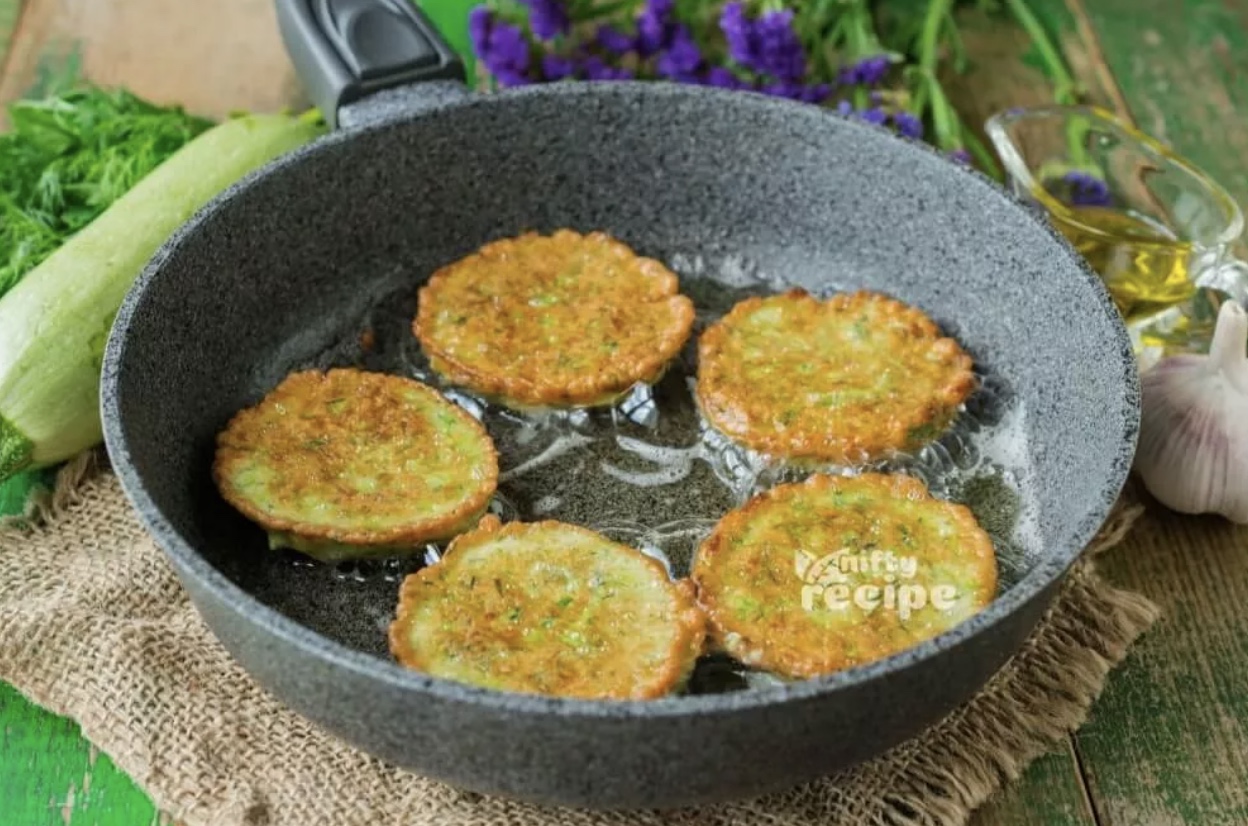 Ingredients for zucchini fritters combined.