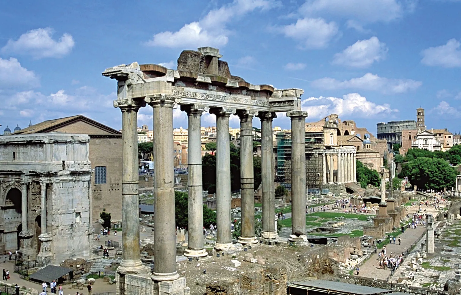 A ruin of large columns supporting a roof surrounded by smaller ruins.